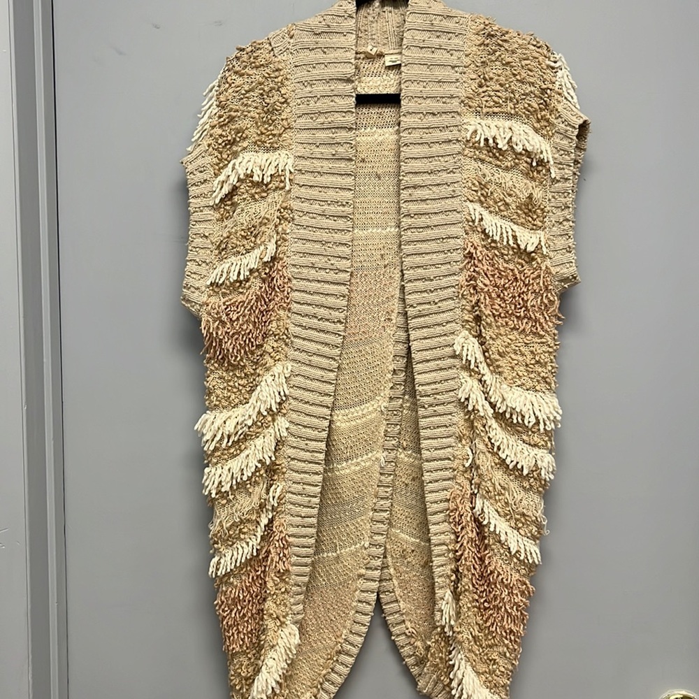 Moth sweater loose knit.